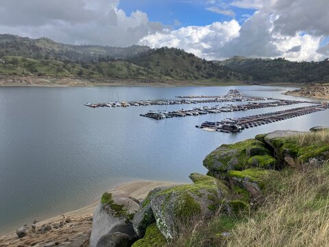 lake, mountains, clouds, and marina