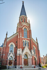 Obraz premium Gothic Church Architecture and Sunny Blue Sky, Low Angle View
