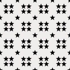 Seamless black stars on a white background.