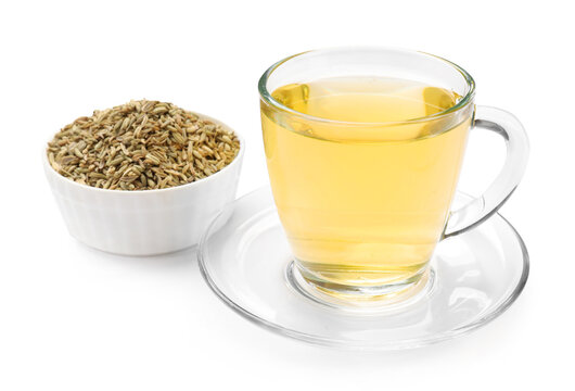 Aromatic fennel tea in cup and seeds isolated on white