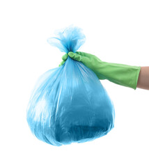 Woman holding plastic bag full of garbage on white background, closeup