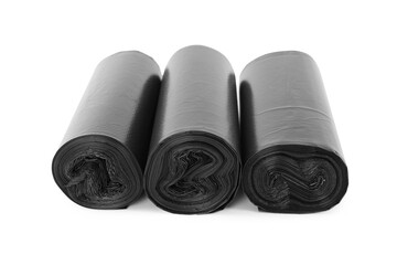 Rolls of black garbage bags isolated on white