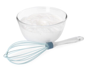 Bowl with whipped cream and whisk isolated on white