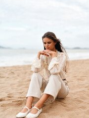 Serene Summer Beauty: A Young Attractive Female Enjoying the Beach Bliss