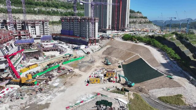 Aerial drone skyview of Hillside Rock Cavern Quarry Development in Anderson Road ,land formation construction housing project in Kwun Tong Sau Mau Ping Tseung Kwan O Kowloon Hong Kong China