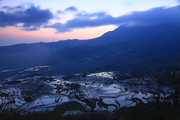 Yuanyang Rice Terraces or known as Yuanyang Terraced Field,known as a land sculpture, the terraced...