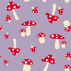 Seamless vector repeat pattern tile with red mushrooms tossed on dusty lavender purple background. Simple fly agaric, amanita muscari shroom toss print for kids, groovy retro designs.