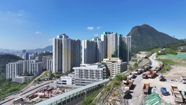 Aerial drone skyview of Hillside Rock Cavern Quarry Development in Anderson Road ,land formation construction housing project in Kwun Tong Sau Mau Ping Tseung Kwan O Kowloon Hong Kong China