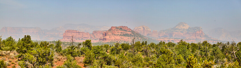 Sedona Desert Panorama with Red Rock Formations and Greenery
