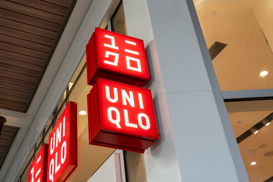 Honolulu, HI,  USA - January 14, 2024: Close-up of Uniqlo logo sign at their store in a shopping mall in Waikiki, Hawaii. Uniqlo Co., Ltd. is a Japanese casual wear designer, fast-fashion manufacturer