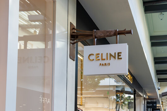 Honolulu, HI,  USA - January 14, 2024: Close-up of Celine hanging store sign at their store in a shopping mall in Waikiki, Hawaii. Celine is a French luxury ready-to-wear and leather goods brand.