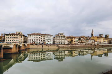 Fototapeta na wymiar Embankment of Arno River in Florence, Italy