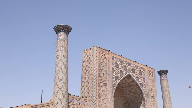 beautioful fascade of madrassa in registan square in Samarkand, Uzbekistan along the historic Silk Road
