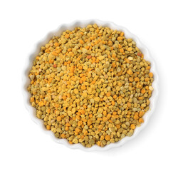Fresh bee pollen granules in bowl isolated on white, top view