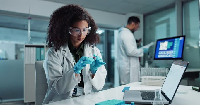 Woman, scientist or blood vial for exam in laboratory, healthcare or pathology to label on test tube. Biotechnology, pharmaceutical and laptop by doctor and online scientific results in phlebotomy