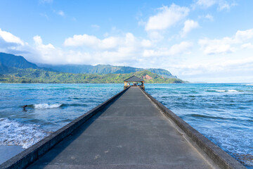 Hanalei Pier in Kauai, Hawai, USA. Hanalei Pier is a pier built into Hanalei Bay on the northern shore of the island of Kauai.