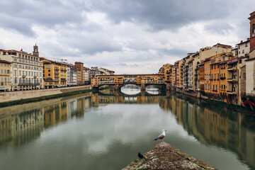 View of the Arno River in Florence and the famous Ponte Vecchio (Old Bridge).