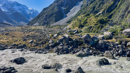 The Hooker river on the hooker valley track towards the alpine lake   nestled under the foot of Aoraki Mt cook in the national park