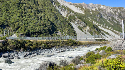 The Hooker river on the hooker valley track towards the alpine lake   nestled under the foot of...