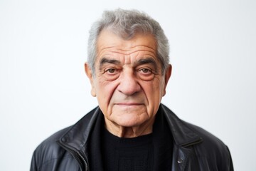 Portrait of an old man in a leather jacket on a white background