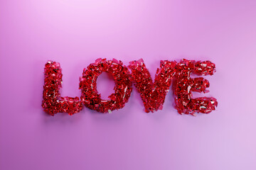 The pink word LOVE explodes into a small particles.