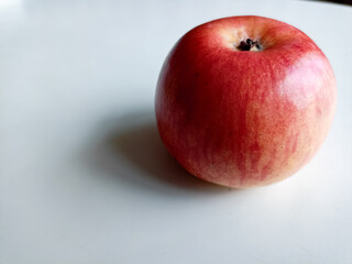 Fresh red apples on wooden table. On wooden background. Top view free space for text.