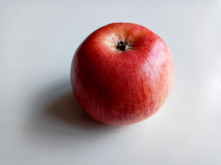 Fresh red apples on wooden table. On wooden background. Top view free space for text.