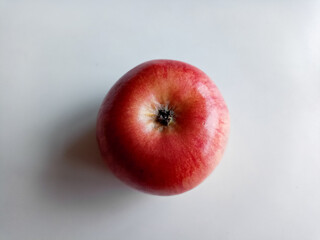 Fresh red apples on wooden table. On wooden background. Top view free space for text.