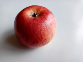 Fresh red apples on wooden table. On wooden background. Top view free space for text.