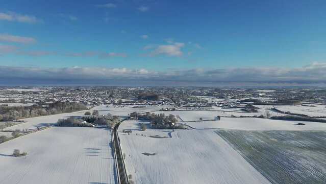 Drone video of snow covered landscape in Denmark