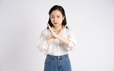 Portrait of young Asian businesswoman posing on white background