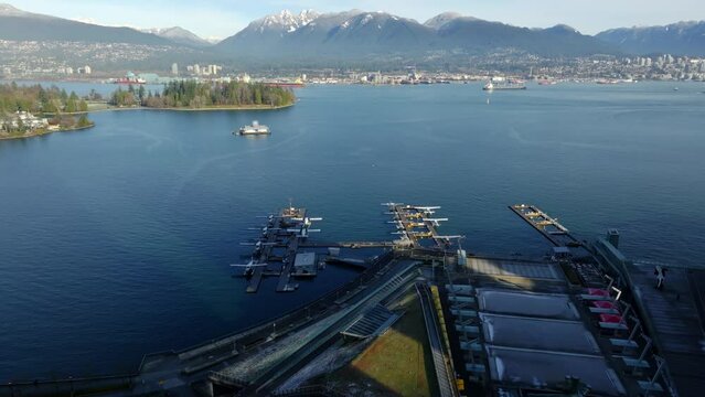 Downtown Vancouver's Seaplane Terminal At Coal Harbour In Vancouver, British Columbia, Canada. Aerial Drone Shot