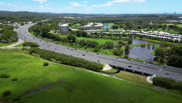 Aerial over Firth Park, M1 and the Glades, Mudgeeraba, Gold Coast, Queensland, Australia