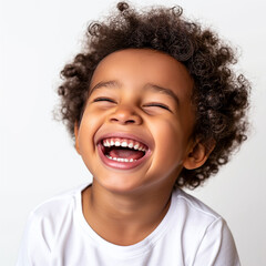 portrait studio photo of a cute mixed race boy child model with perfect clean teeth laughing and smiling. isolated on white background.