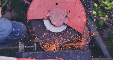 Hot flame welding metal work cutting fire iron workshop. Welding machine iron metal sparking....