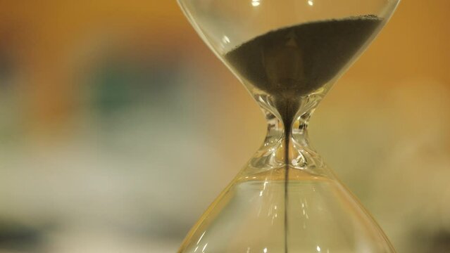 Macro close up video of sand timer running down