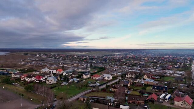 Drone shot of scenic town of Lithuania at sunset, Silute, Europe
