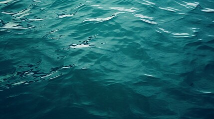 Blue sea water surface texture background. Close up of sea surface. - obrazy, fototapety, plakaty