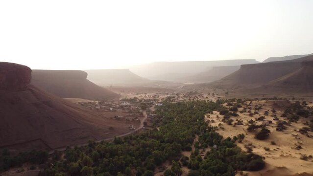 Desert palms valley at sunset in Terjit, Mauritania. Aerial