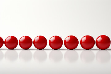 3D rendering of red balls in a row on a white background