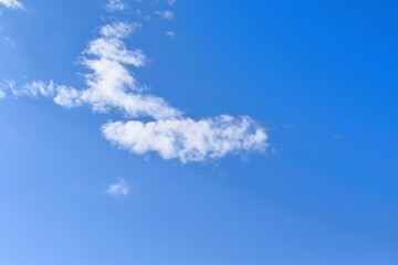 Blue sky with white fluffy cloud. Cumulus clouds background. Cloudscape morning sky. The concepts of freedom of life, never give up and positive though energy.