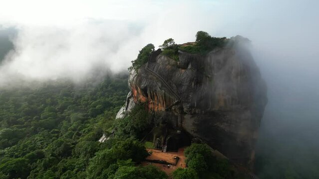 Aerial view over Sigiriya or Lion Rock in Sri Lanka in clouds. An ancient fortress rock landmark