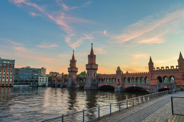 Berlin Germany, sunset city skyline at Oberbaum Bridge and Spree River - 729806839