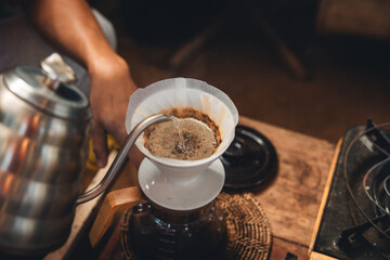 Drip coffee,coffee dripper and hands barista make coffee