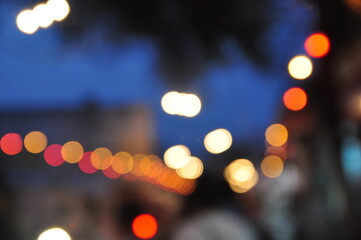 Abstruct defocused circular facula in a street,India