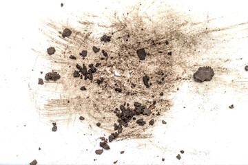pieces of dirt on a white background