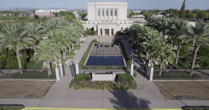 Aerial Shot Of Car Driving By Mormon Temple In Mesa, Arizona
