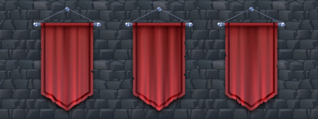 Medieval red cloth banners set isolated on stone background. Vector realistic illustration of silk flags with torn edges hanging on old castle wall, blank frame space for royal sign, vertical pennant © klyaksun