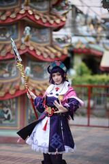 Naklejka premium Portrait of a beautiful young woman game Cosplay with Chinese dress