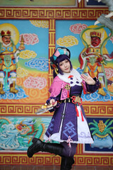 Portrait of a beautiful young woman game Cosplay with Chinese dress